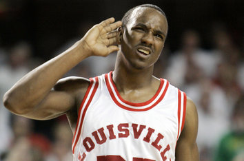 University of Louisville basketball players read books to children