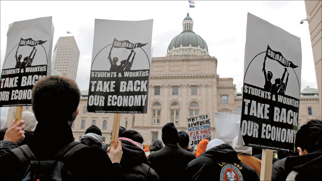 Thousands of union members protested at the Statehouse in March against Republican-backed bills to restrict collective bargaining for teachers and state workers.