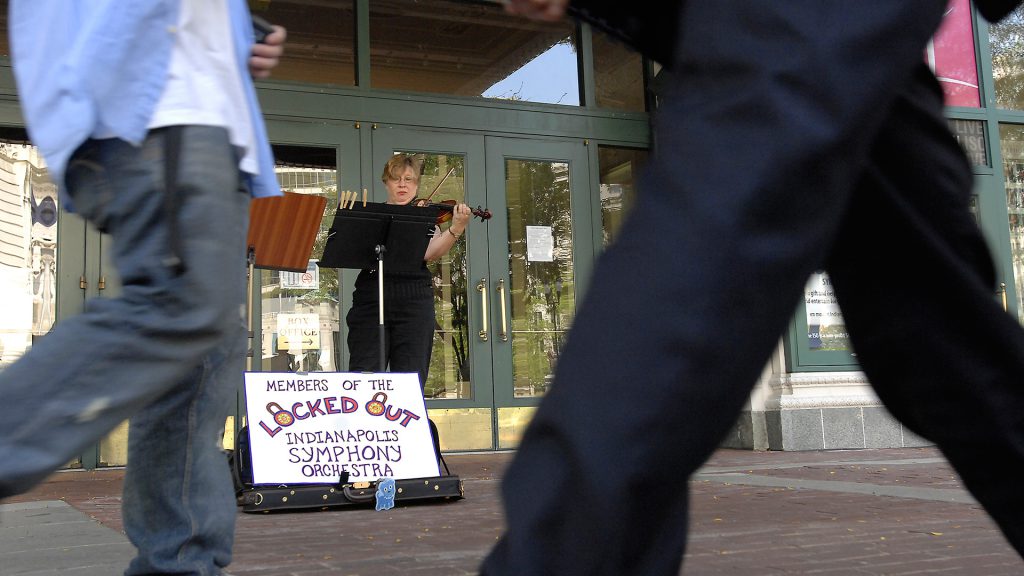 Musicians of the Indianapolis Symphony Orchestra performed daily outside their Monument Circle home during an impasse in contract negotiations that canceled five weeks of performances.