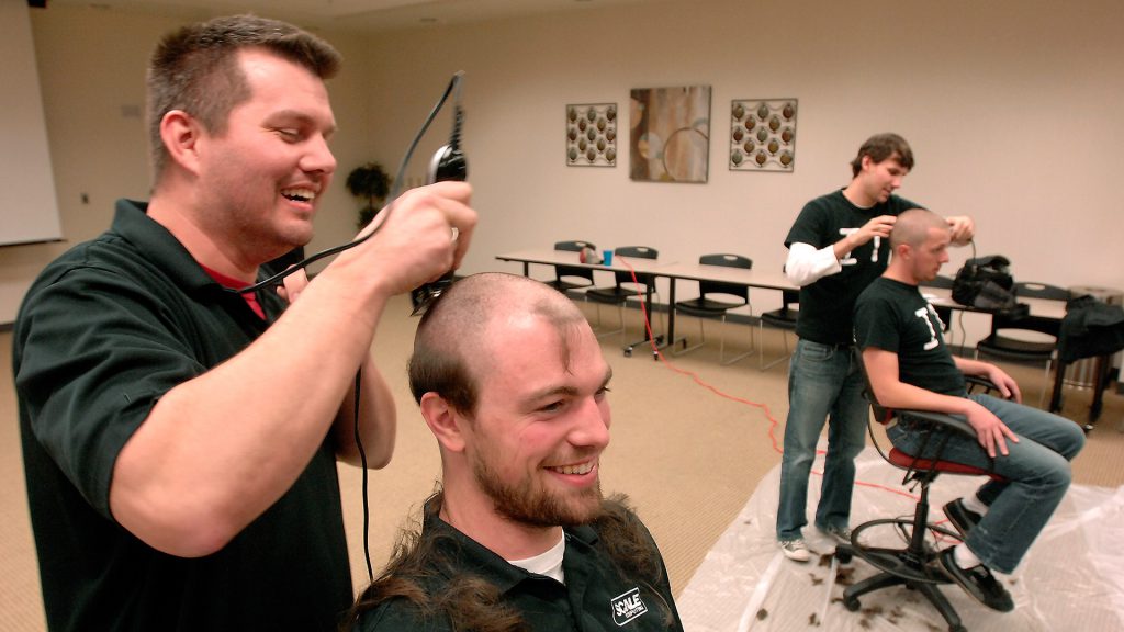 Scale Computing employees in December shaved their heads to show support for Indianapolis Colts Coach Chuck Pagano, who underwent treatment for leukemia.