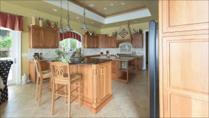 The 7,600-square-foot home's dining room and kitchen are on the main, upper level.