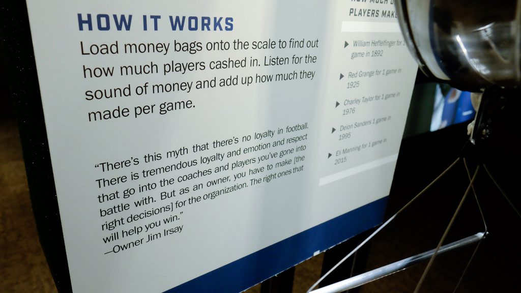 Visitors can put bags on a scale to compare the pay of star players through the ages.