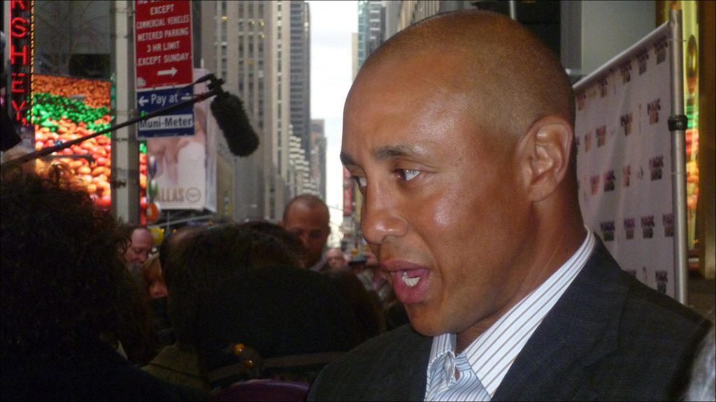 Former New York Knicks star John Starks stops at the red-carpet premiere.