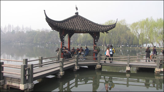 West Lake features towering pagodas and ancient temples.