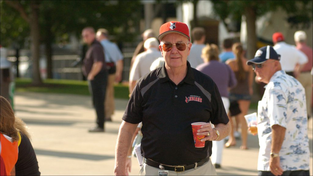Schumacher typically makes four complete circuits of Victory Field during a game, greeting fans and checking to make sure everything's in order.