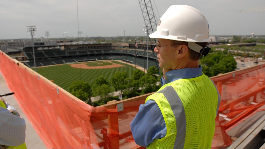 Mike Wells of developer REI Investments looks out toward Victory Field from the fifth floor of the new JW Marriott hotel.