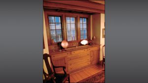 The Davis dining room features a built-in buffet made of quarter-sawn oak.