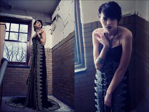 This black halter gown with lace trim and center-front slit is part of Chicago designer Jorge Del Busto's formal wear line.