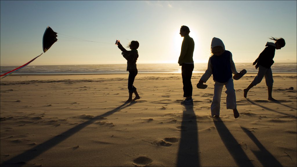 A windy, cloudless beach sunset in Oregon was only a short walk from the family campsite.