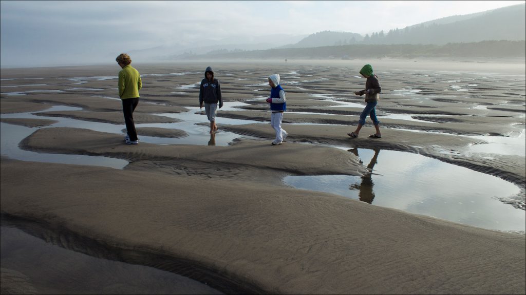 The Arnolds took one last stroll on their Oregon beach at low tide before heading to Washington.