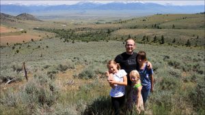 In Nebraska City, Mont., with daughters Emily, Natalie and Carrie, Arnold was still getting used to how big everything feels out West.
