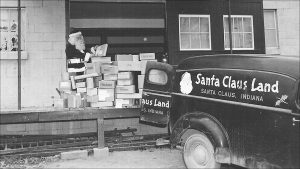 Santa Jim Yellig reviewed boxes of letters from children in 1956 writing Santa at his Indiana address. He responded years before the park opened.