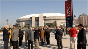 Dignitaries mingle on the north side of Lucas Oil Stadium prior to pre-deflation ceremonies.