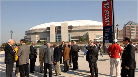Dignitaries mingle on the north side of Lucas Oil Stadium prior to pre-deflation ceremonies.