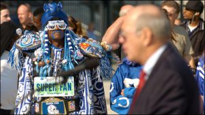 Colts super fan Michael Hopson listens to Frick speak.