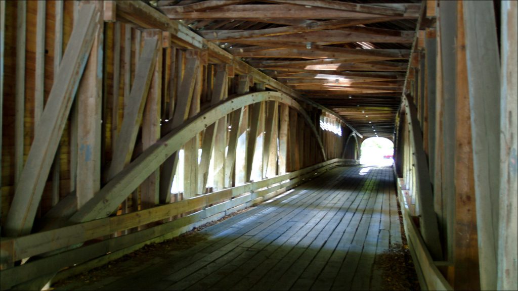 Covered bridges were built sturdy, but leaking roofs and the resulting rot of timbers are common nemeses.