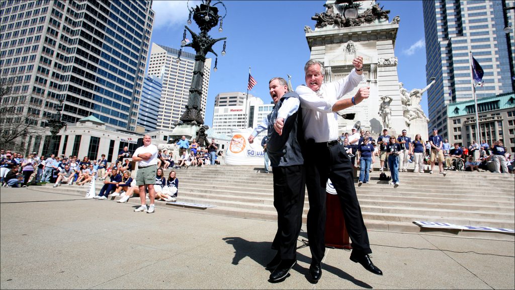 Mayor Greg Ballard and Butler University Athletic Director Barry Collier ham it up at a Monument Circle pep rally for the Butler Bulldogs last spring.