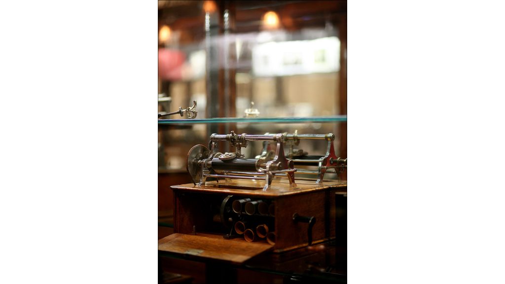 A 1888 Bell and Tainter hand-powered phonograph. Audio technology remains a key component of the office automation industry.