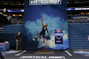 NFL combine a TV spectacle, moneymaker; value under scrutiny, Football