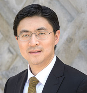 Professional headshot of Purdue University president, Mung Chiang