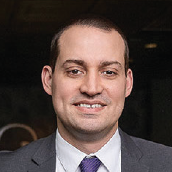 Professional headshot of Chris Creighton