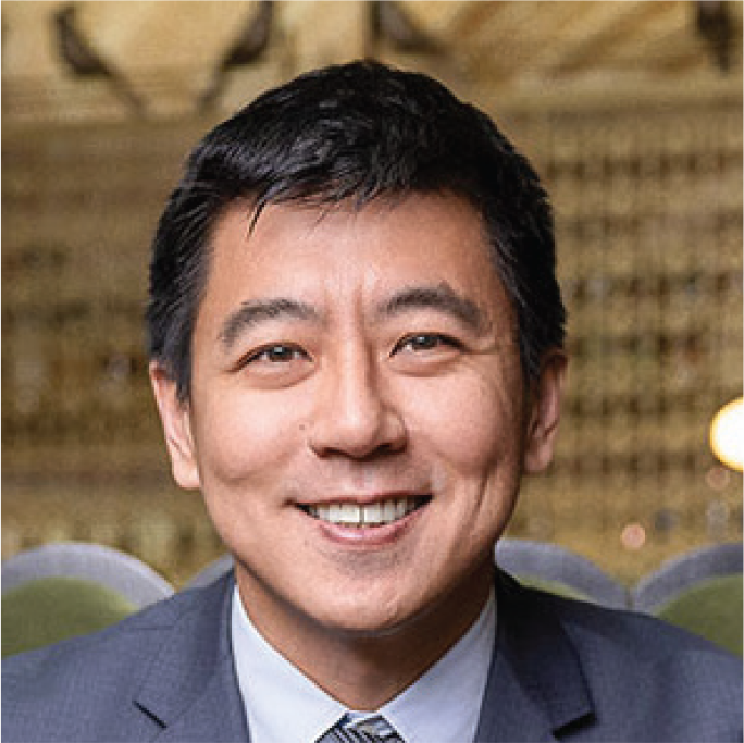 Professional headshot of Geng Wang