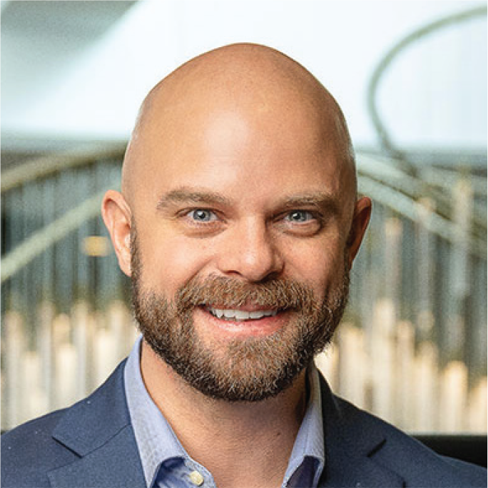 Professional headshot of Ryan Waggoner