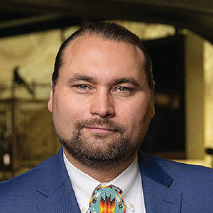 Professional headshot of Travis D. Lovett