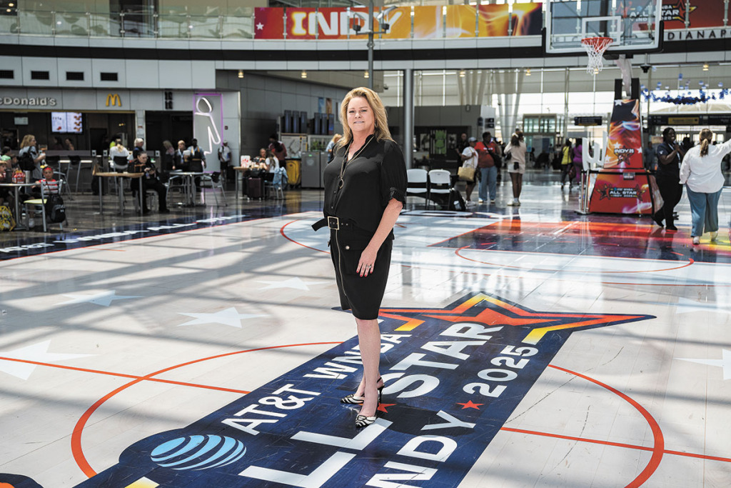 Q&A with Wendy Miles Robbins, whose Miles Printing installed the All-Star court at the airport