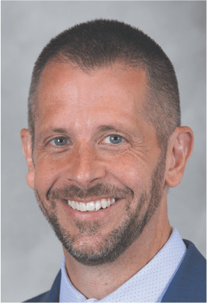 Professional headshot of Dr. Bryan P. Schneider