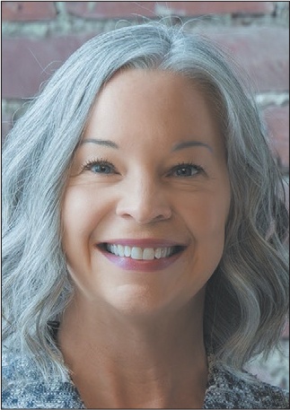 Professional headshot of Erin Hedges