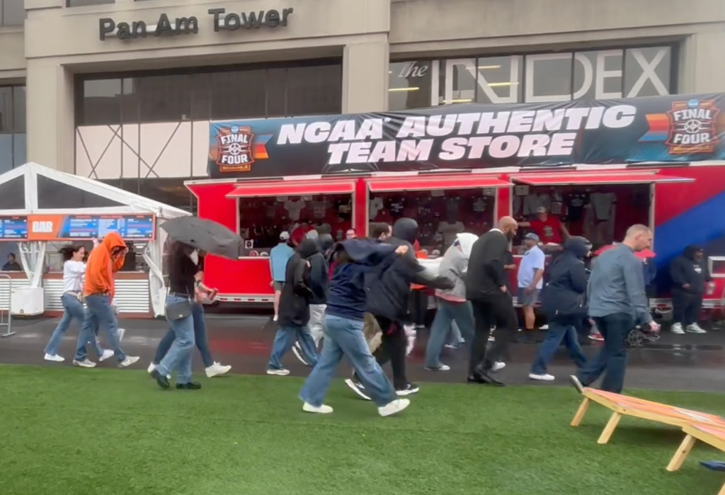 Final Four updates: Rain, wind pick up downtown as fans head to stadium; Michigan’s biggest fan makes trip to Indy