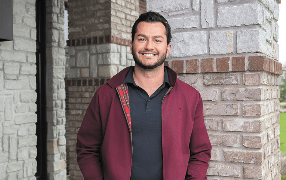 A member of ESG Insurance posed outside