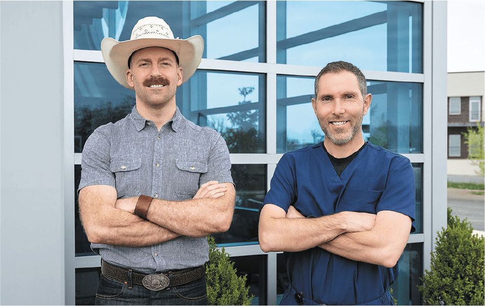 2 members of Wellbridge Surgical posed outdoors